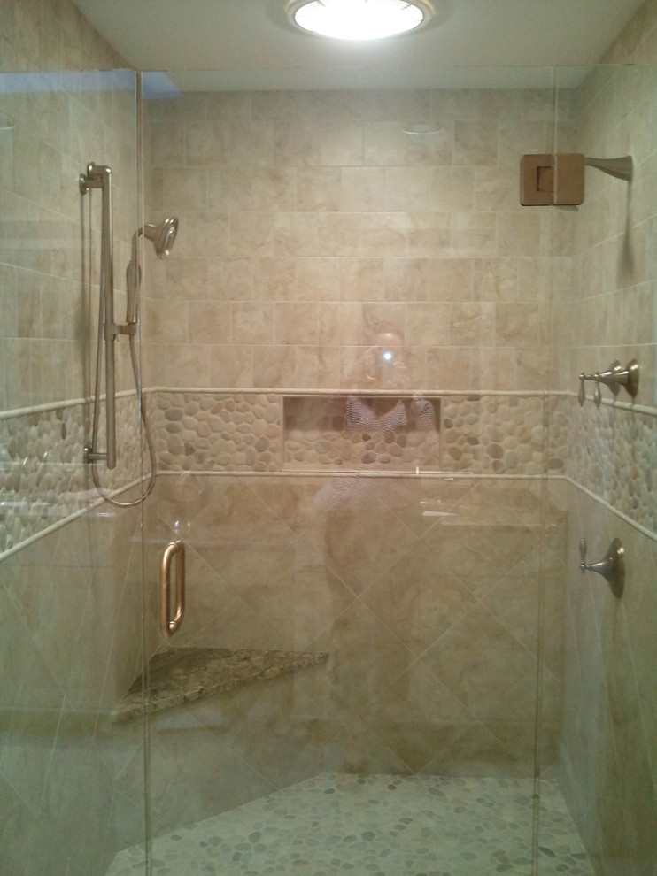 Transitional master beige tile and ceramic tile ceramic tile alcove shower photo in Other with an undermount sink, raised-panel cabinets, white cabinets, granite countertops, an undermount tub and beige walls