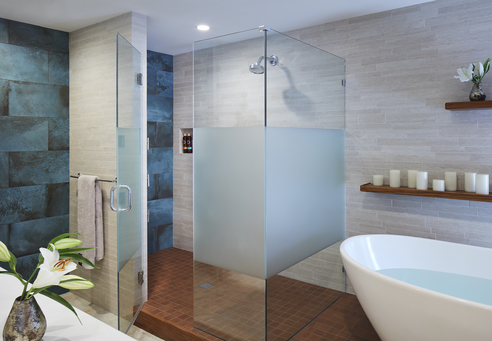 Medium sized contemporary ensuite bathroom in Minneapolis with medium wood cabinets, a freestanding bath, a corner shower, a two-piece toilet, ceramic tiles, white walls, marble flooring, a submerged sink and marble worktops.
