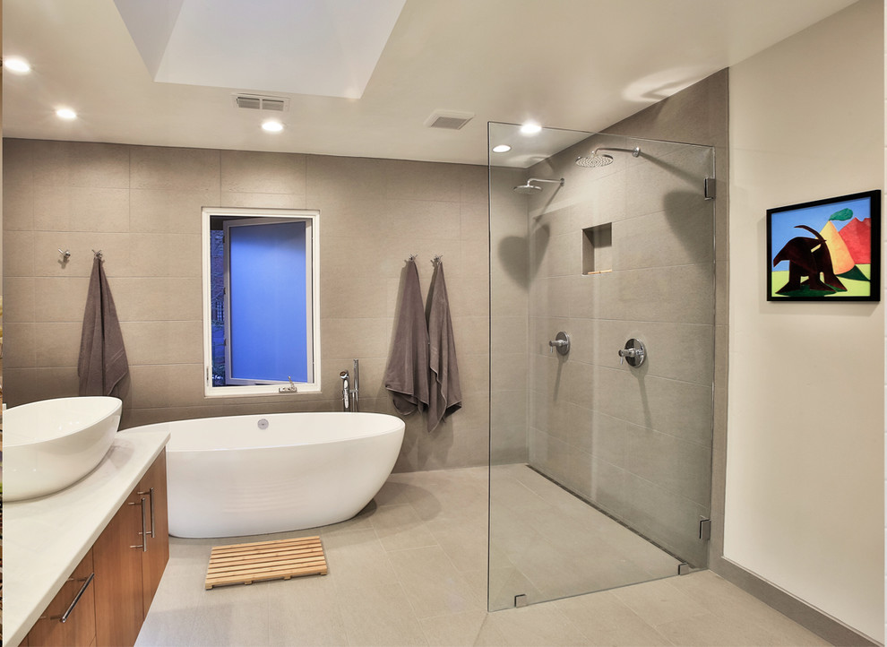 Contemporary bathroom in Sacramento with a double shower, a freestanding bath and a vessel sink.