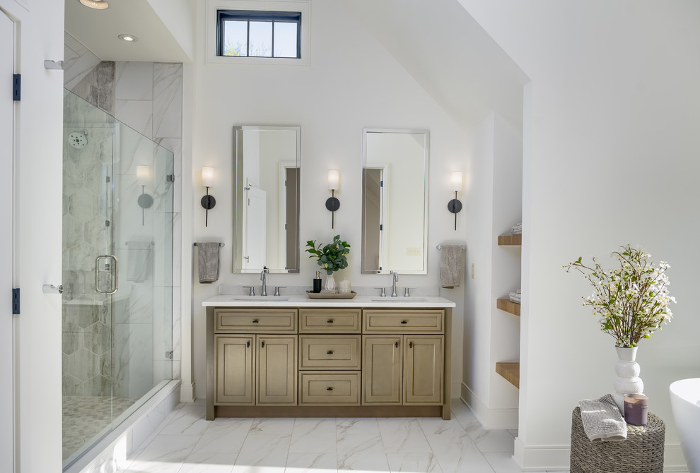 Bathroom - large transitional master white tile white floor bathroom idea in Indianapolis with beaded inset cabinets, medium tone wood cabinets, a two-piece toilet, white walls, an undermount sink, quartz countertops, a hinged shower door and white countertops