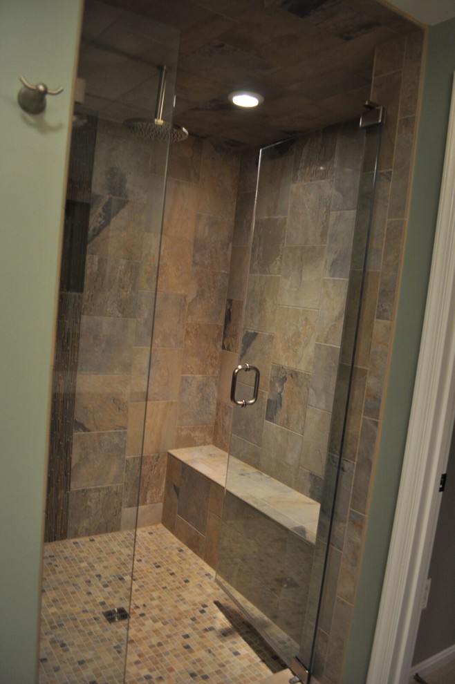 Example of a mid-sized transitional 3/4 multicolored tile and stone tile slate floor alcove shower design in DC Metro with shaker cabinets, dark wood cabinets, a two-piece toilet, green walls, an undermount sink and quartz countertops