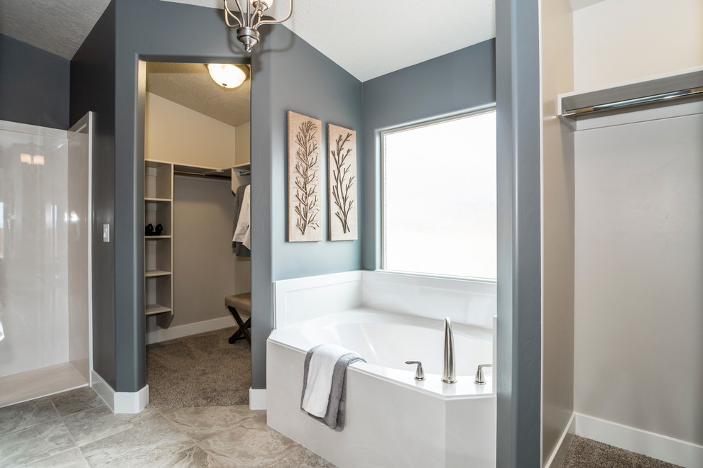 Inspiration for a mid-sized transitional master beige tile and porcelain tile ceramic tile and beige floor bathroom remodel in Salt Lake City with dark wood cabinets, a two-piece toilet, an integrated sink, gray walls, shaker cabinets and solid surface countertops