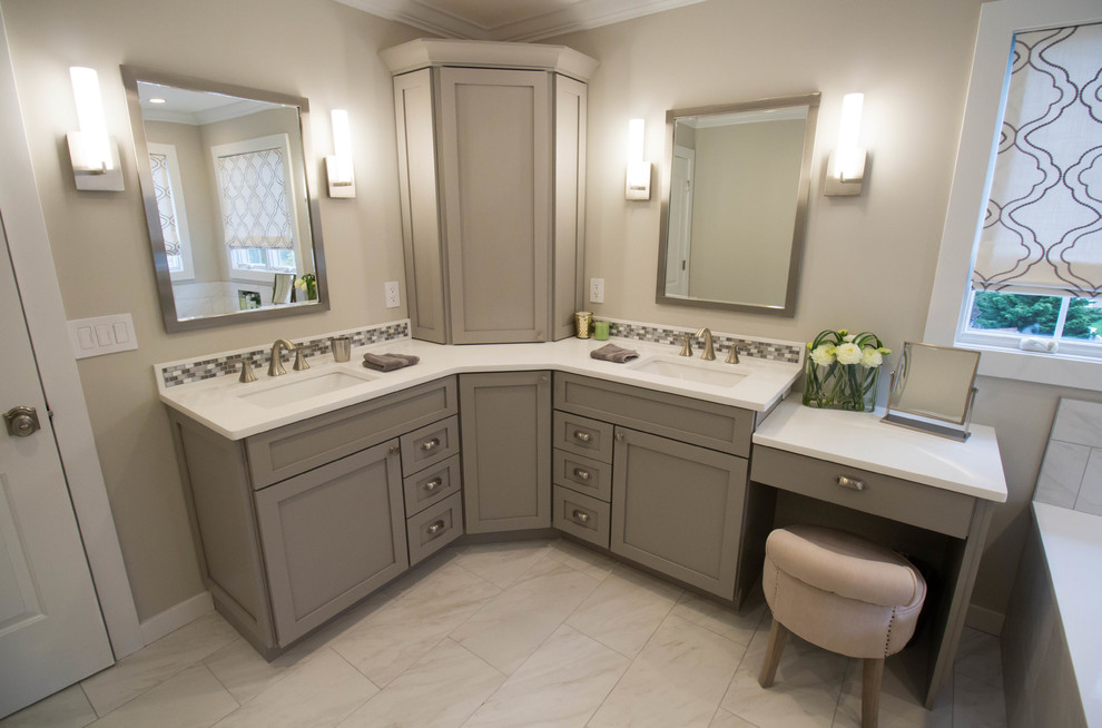 Large classic ensuite bathroom in Newark with shaker cabinets, grey cabinets, a submerged bath, a corner shower, a one-piece toilet, white tiles, porcelain tiles, beige walls, porcelain flooring, a submerged sink and engineered stone worktops.