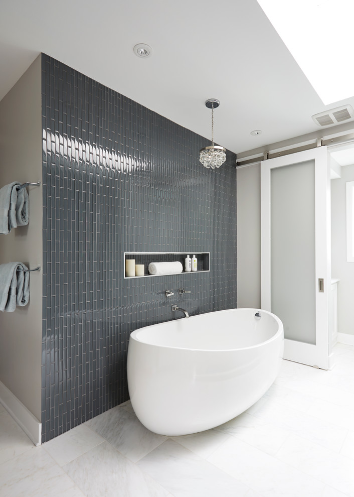 Large classic ensuite bathroom in Boise with a freestanding bath, grey walls, marble flooring, a vessel sink, marble worktops and grey tiles.