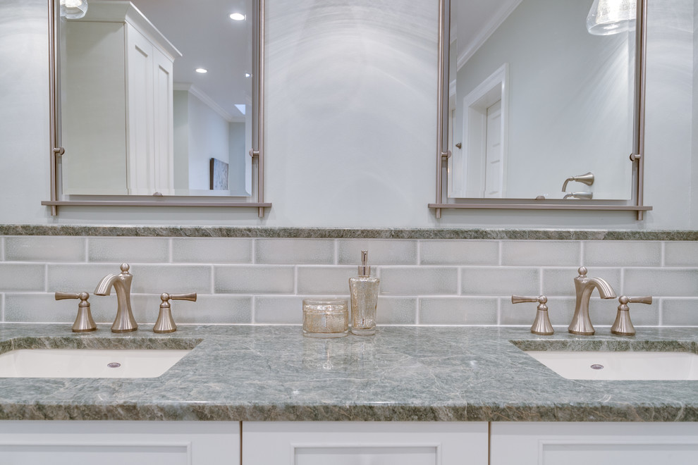 Large transitional master gray tile bathroom photo in DC Metro with recessed-panel cabinets, white cabinets, an undermount tub, an undermount sink and granite countertops