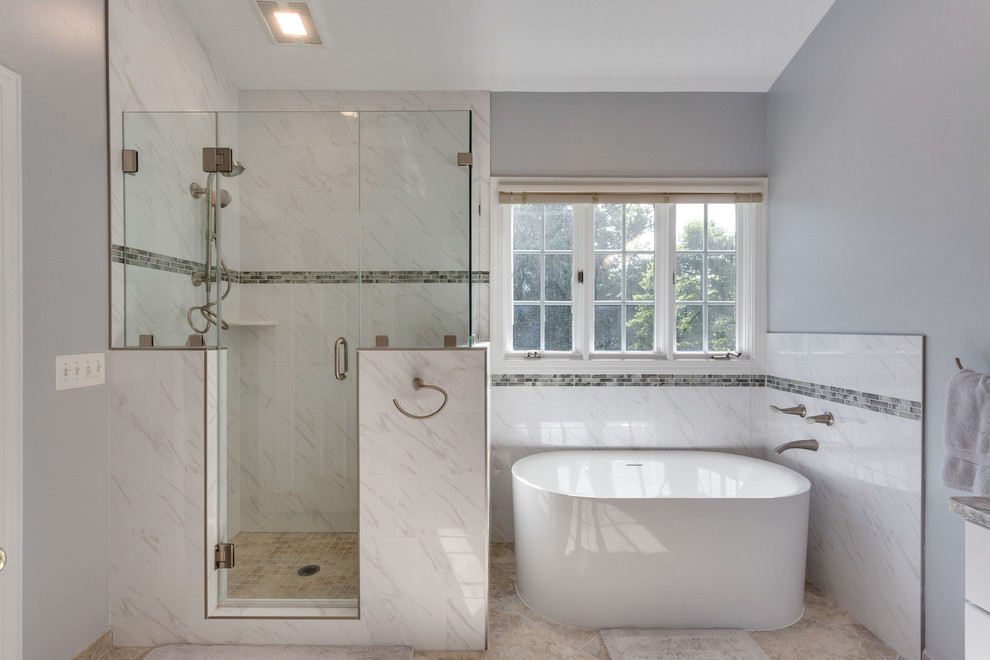 Large traditional ensuite bathroom in DC Metro with shaker cabinets, white cabinets, a freestanding bath, a corner shower, a submerged sink, engineered stone worktops and a hinged door.