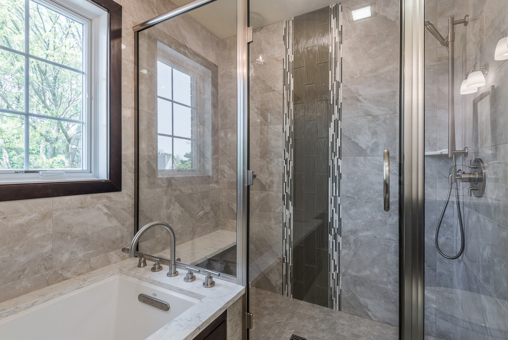 Medium sized traditional ensuite bathroom in Chicago with shaker cabinets, dark wood cabinets, a submerged bath, an alcove shower, a two-piece toilet, beige tiles, blue walls, ceramic flooring, a submerged sink and engineered stone worktops.