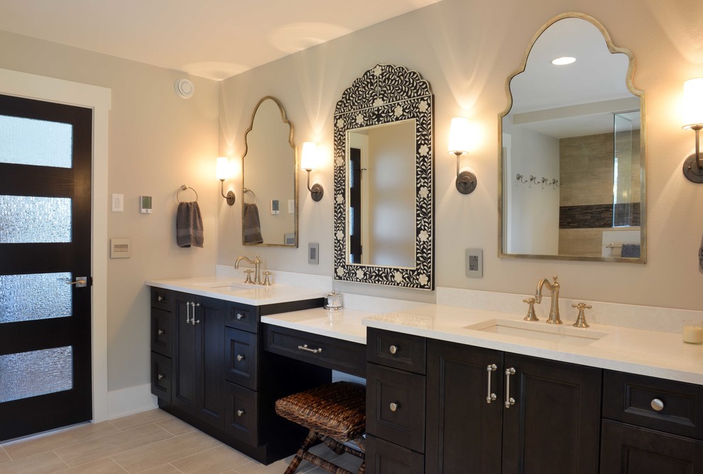 Example of a large transitional master beige tile and porcelain tile porcelain tile bathroom design in Other with flat-panel cabinets, dark wood cabinets, quartzite countertops, gray walls and an undermount sink