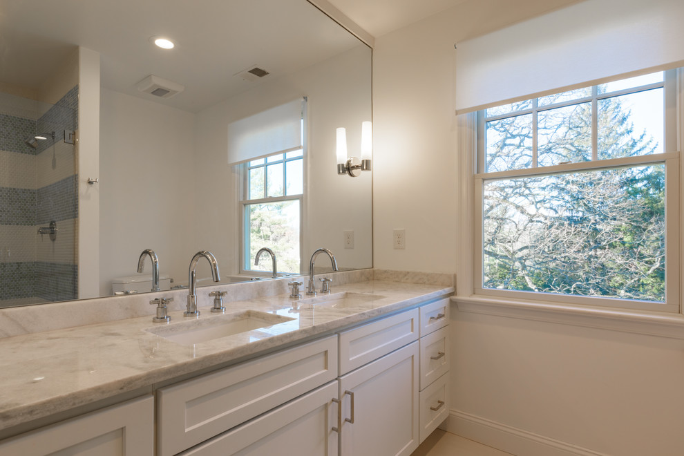 Inspiration for a mid-sized transitional kids' white tile and ceramic tile marble floor and gray floor bathroom remodel in Other with flat-panel cabinets, white cabinets, white walls, an undermount sink and marble countertops