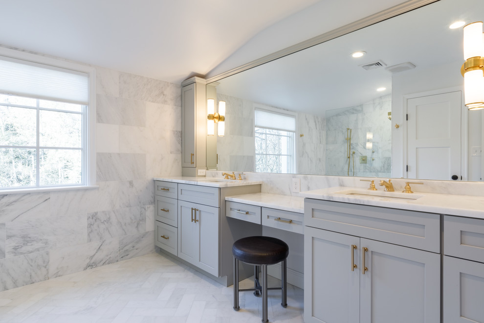 Large transitional master gray tile and marble tile marble floor and gray floor bathroom photo in Other with flat-panel cabinets, gray cabinets, gray walls, an undermount sink and marble countertops