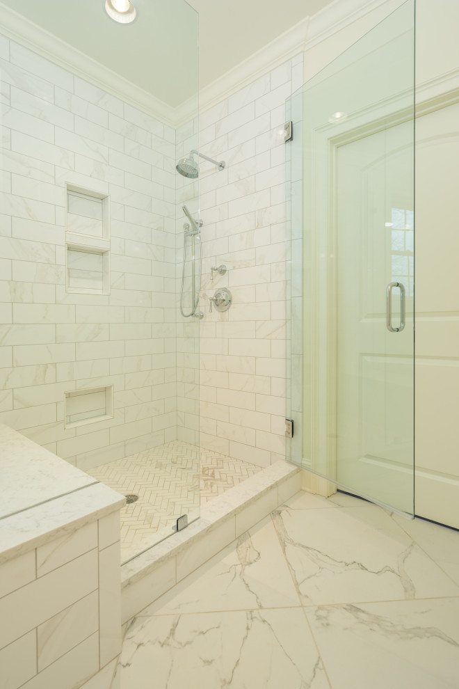 Inspiration for a mid-sized timeless master white tile and subway tile marble floor and white floor bathroom remodel in Other with white walls and a hinged shower door