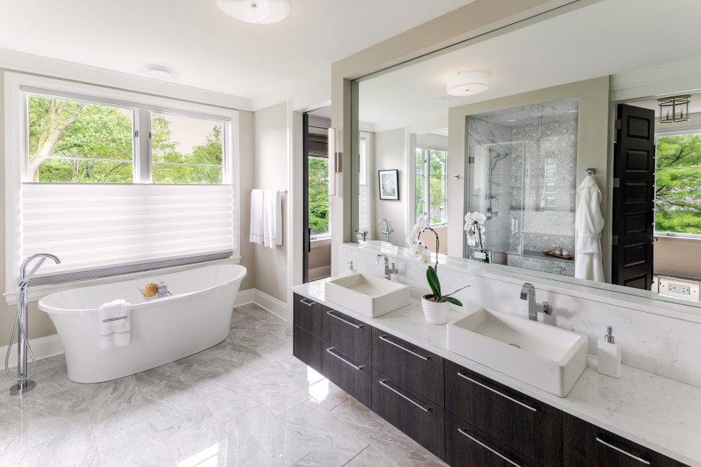 Large cottage master white tile marble floor, gray floor and double-sink bathroom photo in Chicago with flat-panel cabinets, dark wood cabinets, beige walls, a vessel sink, marble countertops, a hinged shower door, white countertops and a floating vanity
