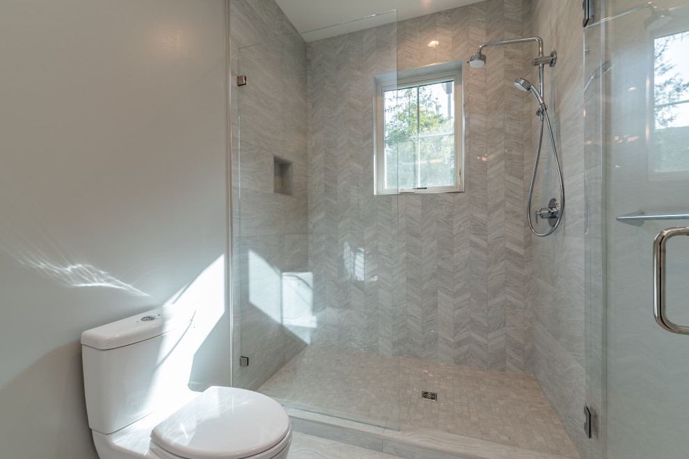 Inspiration for a large traditional shower room bathroom in San Francisco with flat-panel cabinets, white cabinets, an alcove bath, an alcove shower, a one-piece toilet, white tiles, porcelain tiles, grey walls, light hardwood flooring, a submerged sink, engineered stone worktops, grey floors, a hinged door and white worktops.