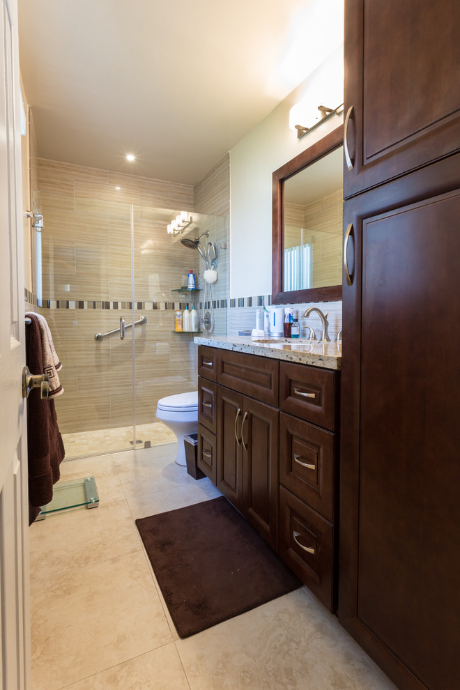 Example of a small transitional kids' beige tile and porcelain tile porcelain tile alcove shower design in Miami with an undermount sink, shaker cabinets, medium tone wood cabinets, granite countertops, a two-piece toilet and beige walls