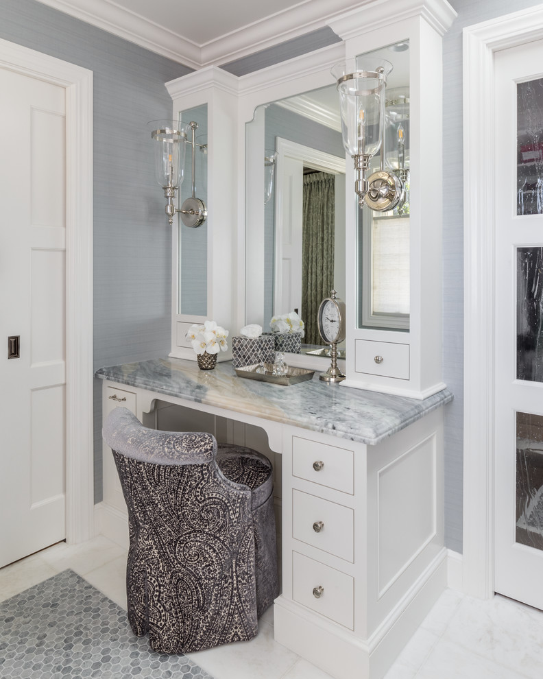 Example of a mid-sized transitional master gray tile and porcelain tile porcelain tile and white floor drop-in bathtub design in San Francisco with recessed-panel cabinets, white cabinets, gray walls, an undermount sink, marble countertops and gray countertops