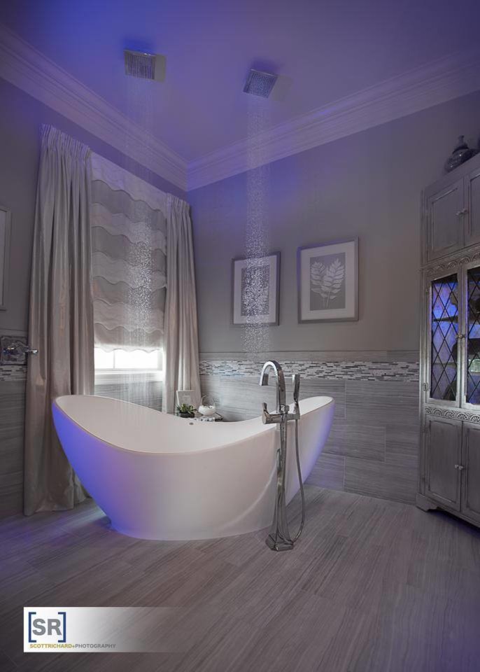 Bathroom - mid-sized transitional master gray tile and porcelain tile porcelain tile bathroom idea in New Orleans with furniture-like cabinets, distressed cabinets, a two-piece toilet, gray walls, an undermount sink and granite countertops