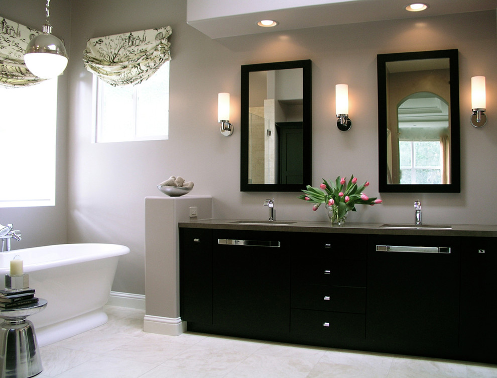 Large elegant master limestone floor bathroom photo in San Francisco with flat-panel cabinets, dark wood cabinets, gray walls, an undermount sink and quartzite countertops