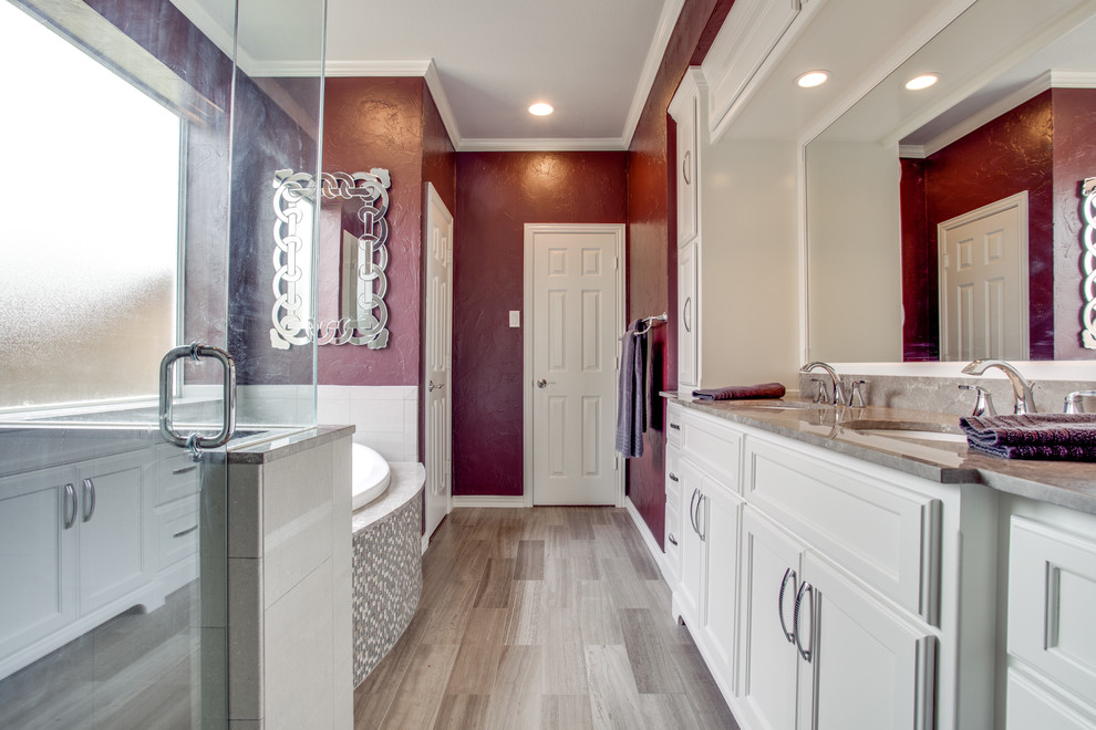 Medium sized contemporary ensuite bathroom in Seattle with beaded cabinets, white cabinets, a built-in bath, a corner shower, white tiles, porcelain tiles, purple walls, porcelain flooring, a submerged sink, quartz worktops, beige floors and a hinged door.