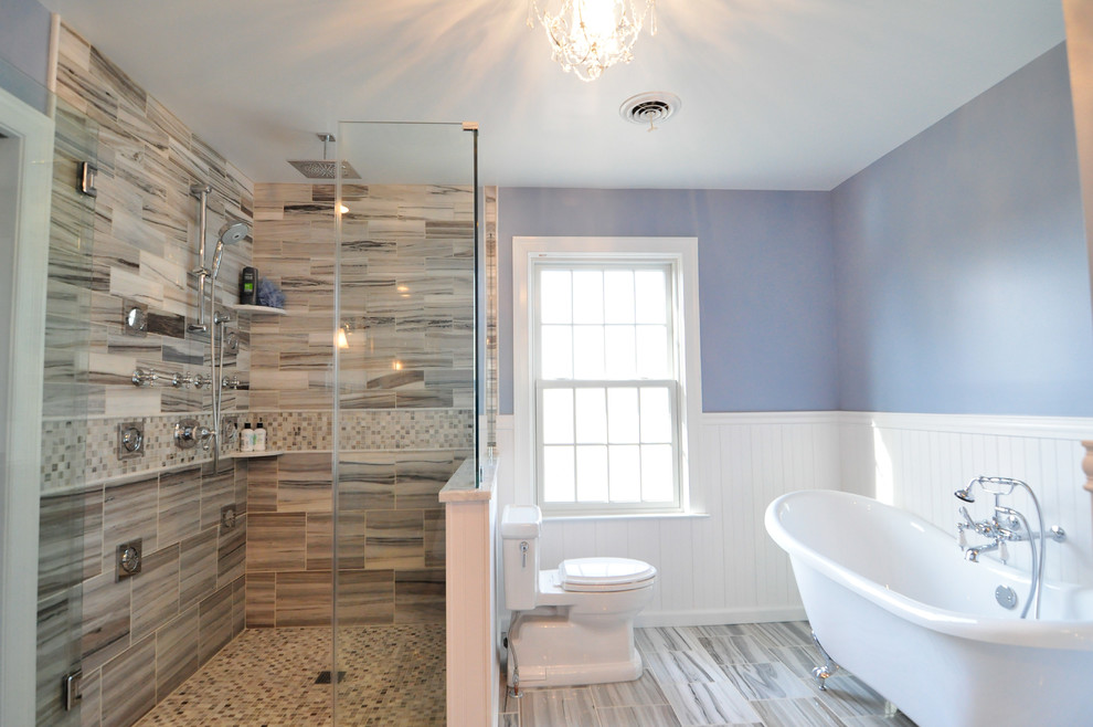 Inspiration for a large transitional master multicolored tile and stone slab marble floor bathroom remodel in Philadelphia with an undermount sink, furniture-like cabinets, gray cabinets, marble countertops, a two-piece toilet and blue walls