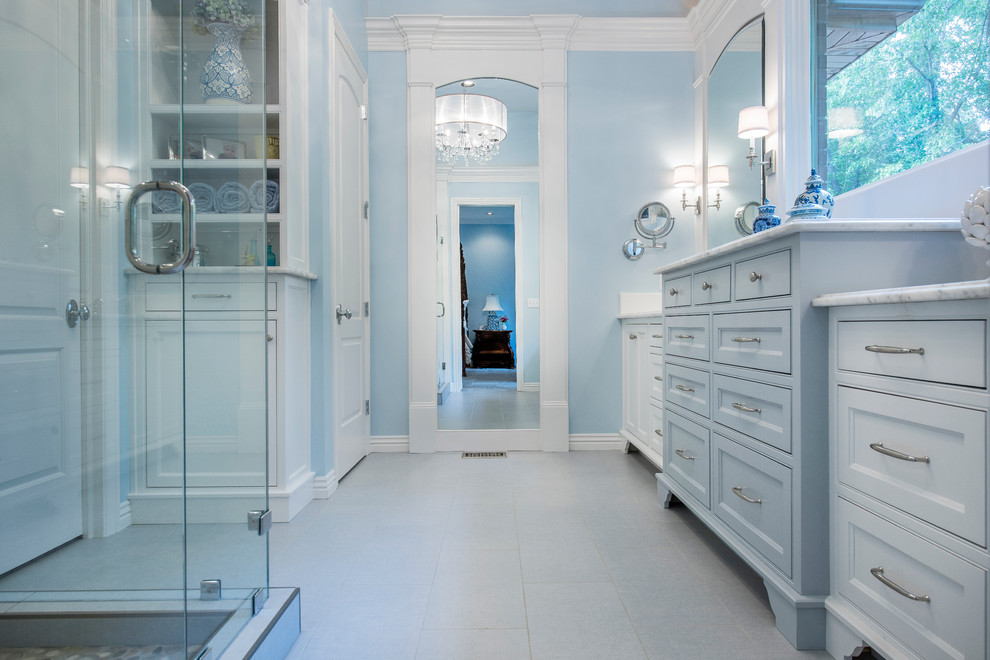 Medium sized classic ensuite bathroom in Other with beaded cabinets, white cabinets, engineered stone worktops, a corner shower, grey tiles, blue walls, porcelain flooring, porcelain tiles and a submerged sink.