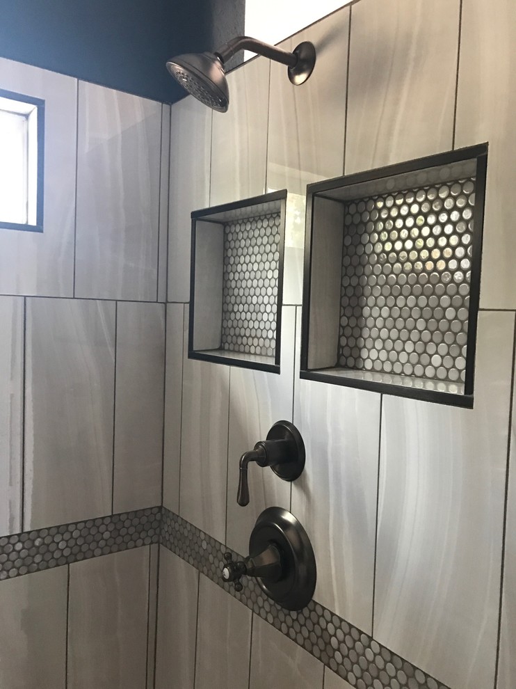 Alcove shower - mid-sized transitional master gray tile and porcelain tile mosaic tile floor and gray floor alcove shower idea in Phoenix with a pedestal sink, black walls and a hinged shower door