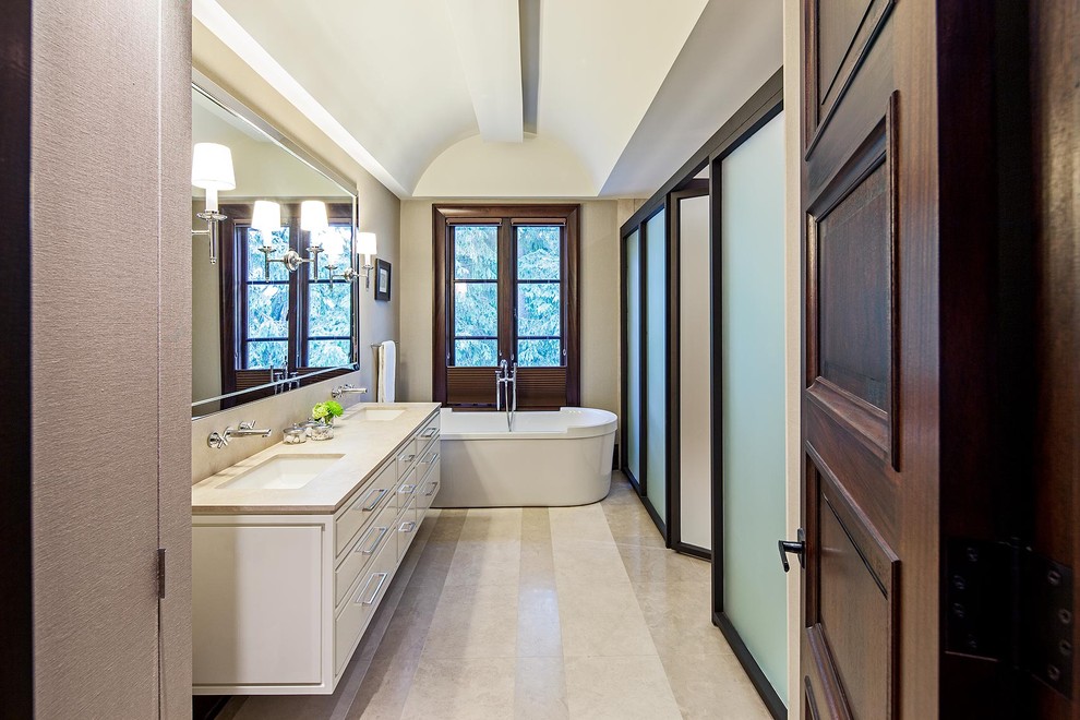 Example of a large transitional master porcelain tile freestanding bathtub design in Toronto with an undermount sink, flat-panel cabinets, white cabinets, white walls and quartz countertops