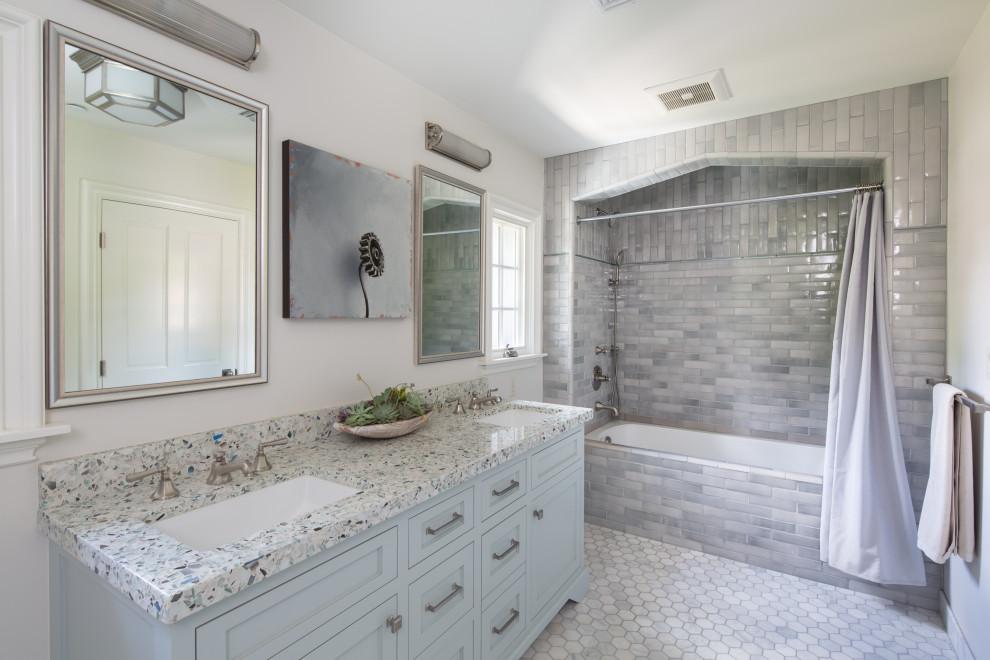 Inspiration for a huge transitional kids' white tile and limestone tile limestone floor and gray floor bathroom remodel in Los Angeles with shaker cabinets, gray cabinets, white walls, an undermount sink, quartzite countertops, a hinged shower door and multicolored countertops