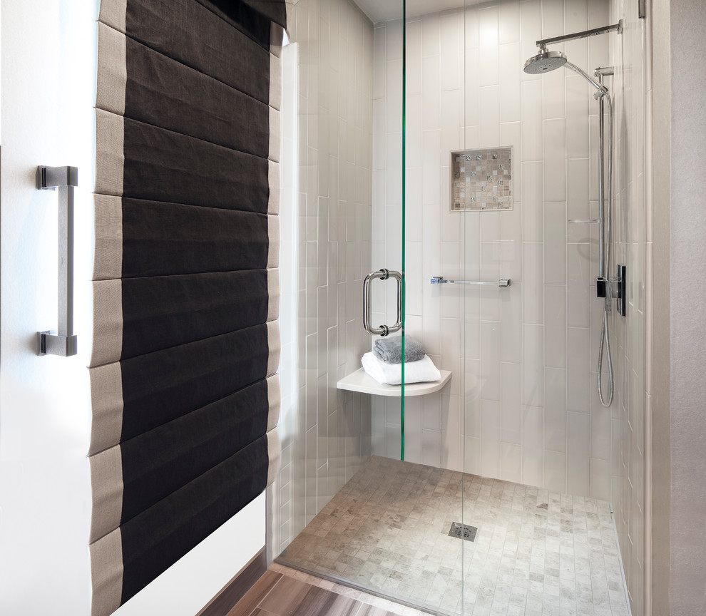 Medium sized traditional ensuite bathroom in Kansas City with recessed-panel cabinets, white cabinets, a freestanding bath, an alcove shower, a two-piece toilet, grey tiles, porcelain tiles, grey walls, porcelain flooring, a submerged sink and engineered stone worktops.