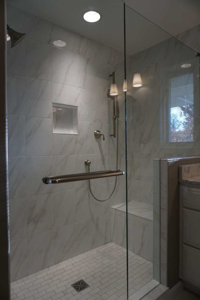 Inspiration for a mid-sized contemporary master gray tile and white tile alcove shower remodel in Cincinnati with raised-panel cabinets, white cabinets, brown walls and an undermount sink