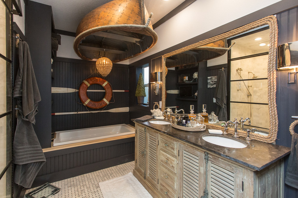 Large nautical ensuite bathroom in Tampa with light wood cabinets, a built-in bath, a submerged sink, marble worktops, blue walls, multi-coloured floors and louvered cabinets.