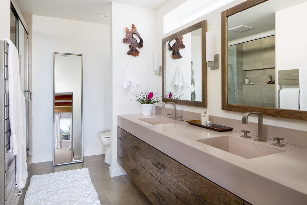 Inspiration for a large contemporary master gray tile and porcelain tile porcelain tile double shower remodel in San Francisco with flat-panel cabinets, distressed cabinets, a one-piece toilet, white walls, an integrated sink and concrete countertops