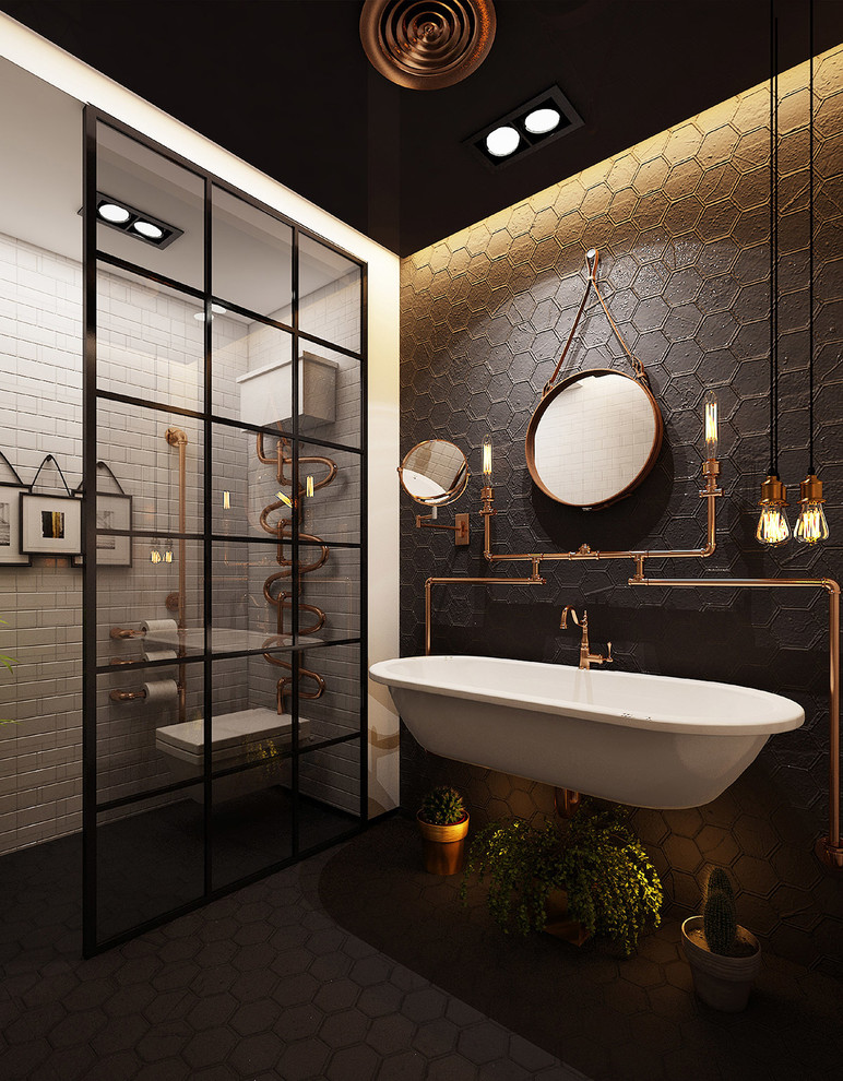 Стильный дизайн: ванная комната: освещение в стиле лофт с черной плиткой, цементной плиткой, черными стенами, полом из цементной плитки, душевой кабиной, подвесной раковиной и черным полом - последний тренд