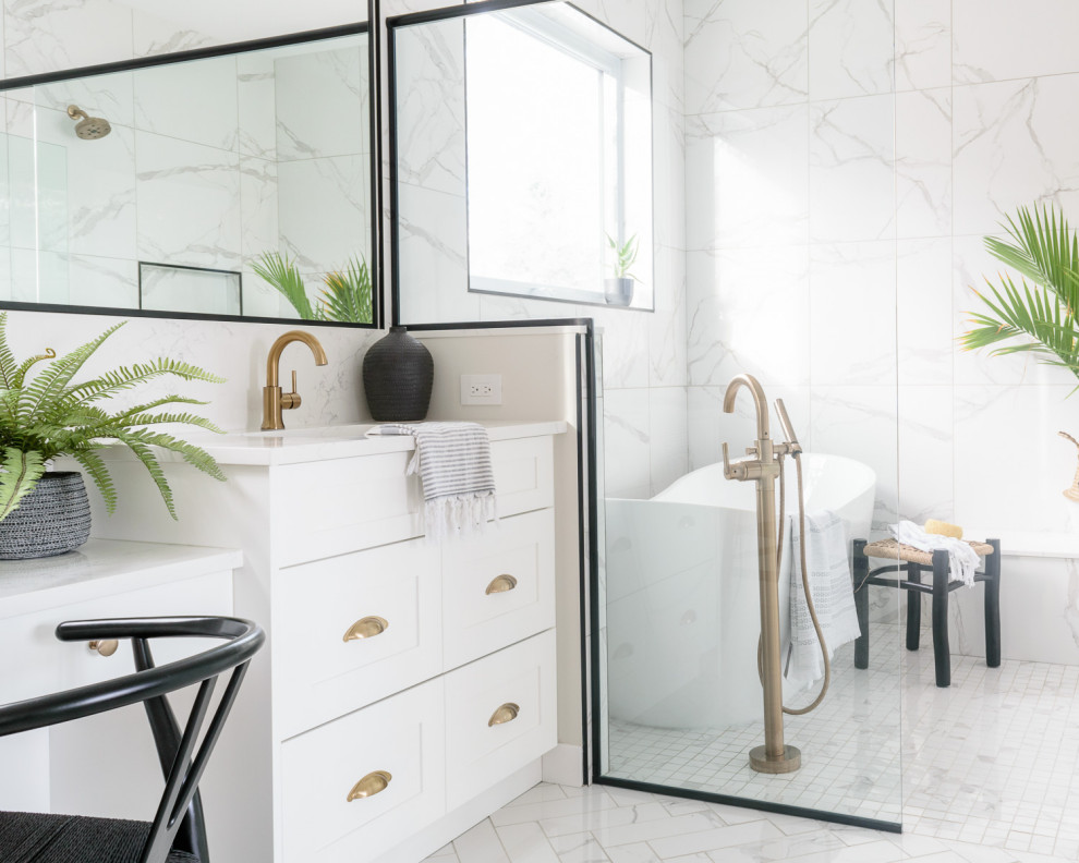 Example of a mid-sized transitional master white tile and ceramic tile porcelain tile, white floor and double-sink bathroom design in Other with shaker cabinets, white cabinets, a two-piece toilet, white walls, an undermount sink, quartz countertops, a hinged shower door, white countertops and a built-in vanity