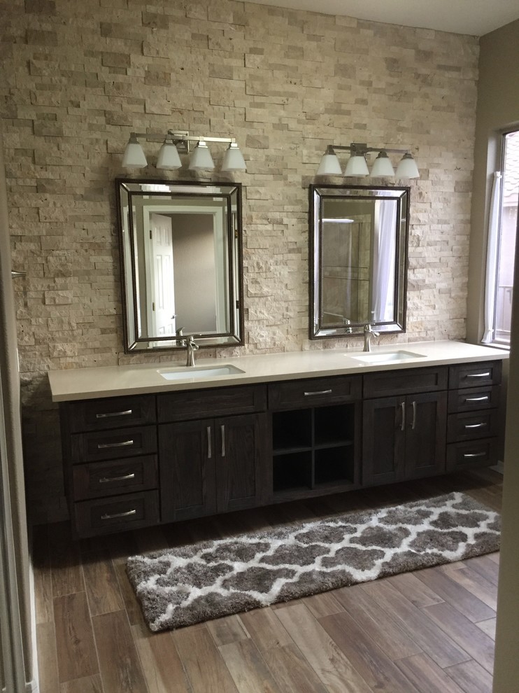 Mid-sized transitional master brown tile bathroom photo in Phoenix with shaker cabinets, dark wood cabinets and quartz countertops