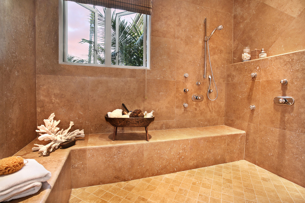 Inspiration for a huge tropical master beige tile and stone tile travertine floor alcove shower remodel in Orange County