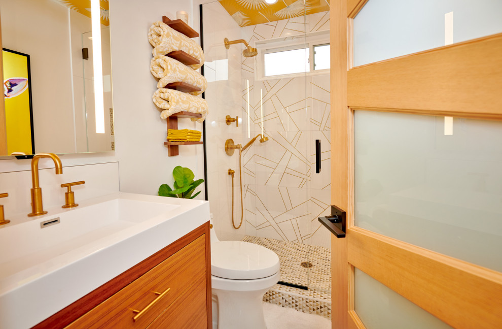 Example of a small island style kids' white tile and porcelain tile mosaic tile floor, white floor, single-sink and wallpaper ceiling bathroom design in Denver with flat-panel cabinets, medium tone wood cabinets, a two-piece toilet, white walls, an integrated sink, quartz countertops, a hinged shower door, white countertops and a floating vanity
