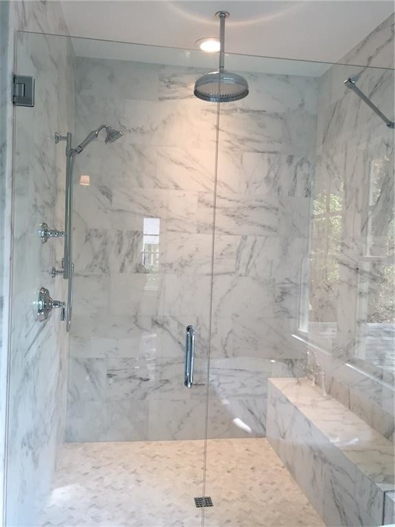 Design ideas for a large traditional ensuite bathroom in Atlanta with a freestanding bath, an alcove shower, grey tiles, white tiles, stone tiles, grey walls, shaker cabinets, white cabinets, marble flooring, a submerged sink and marble worktops.