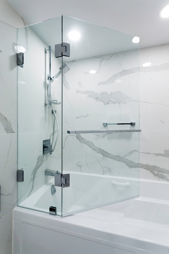 Inspiration for a small contemporary 3/4 white tile and porcelain tile porcelain tile and white floor bathroom remodel in Vancouver with flat-panel cabinets, white cabinets, a one-piece toilet, white walls, an undermount sink, quartz countertops and a hinged shower door