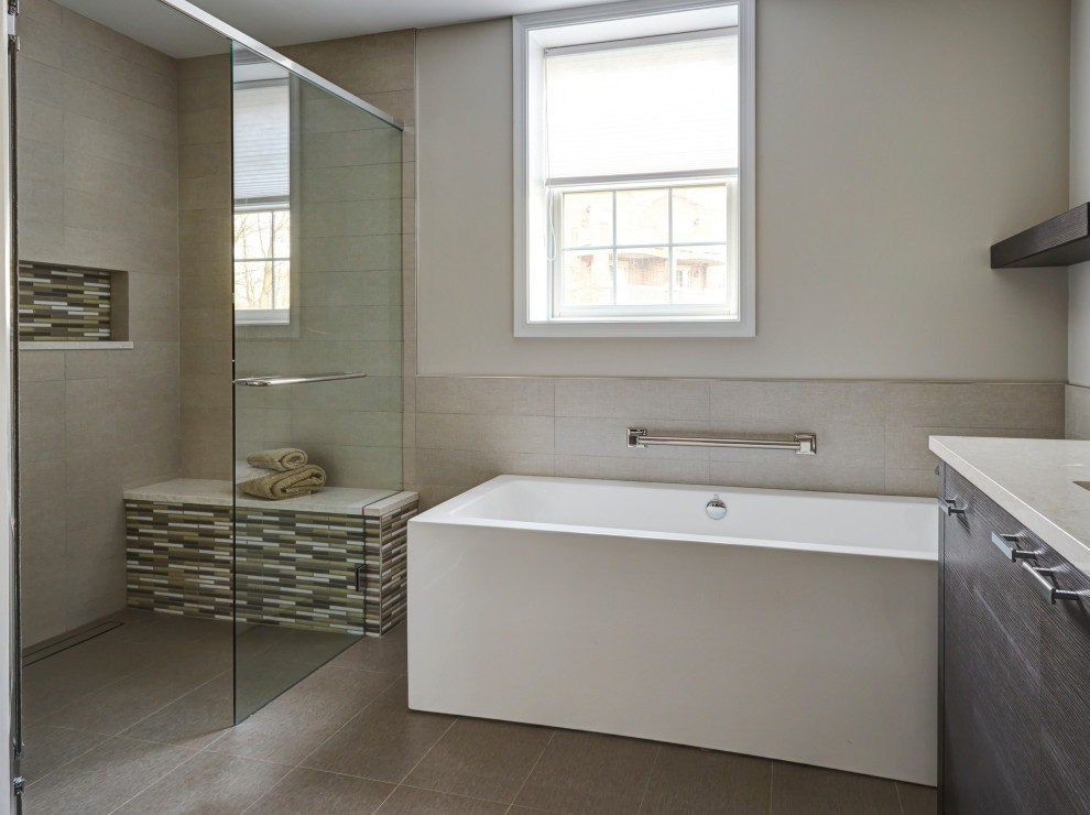 Bathroom - large contemporary master gray tile and porcelain tile porcelain tile and gray floor bathroom idea in Chicago with flat-panel cabinets, dark wood cabinets, a two-piece toilet, beige walls, an undermount sink, quartz countertops, a hinged shower door and beige countertops