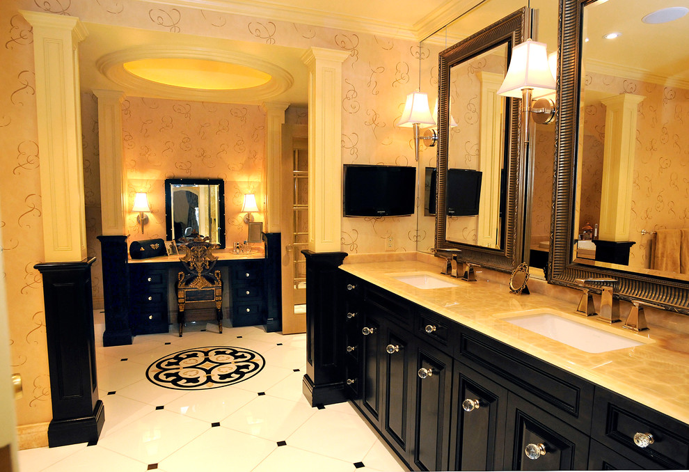 Large elegant master ceramic tile and multicolored floor bathroom photo in Other with a drop-in sink, raised-panel cabinets, black cabinets, beige walls and limestone countertops