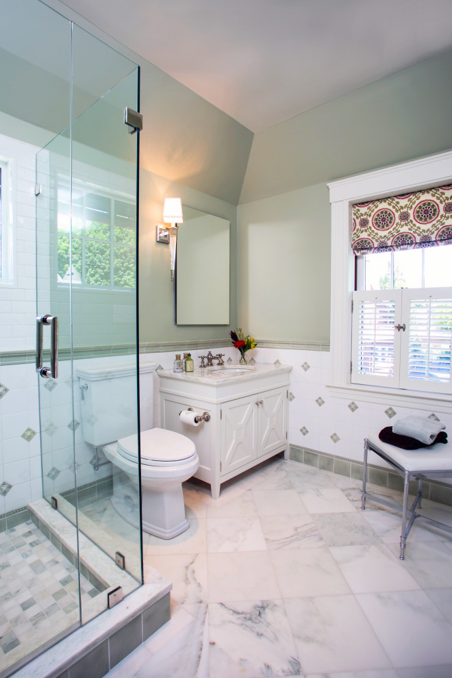 Design ideas for a medium sized traditional shower room bathroom in Boston with white cabinets, a corner shower, a two-piece toilet, green tiles, white tiles, green walls, a submerged sink, grey floors, a hinged door, beige worktops, a single sink, a built in vanity unit and recessed-panel cabinets.