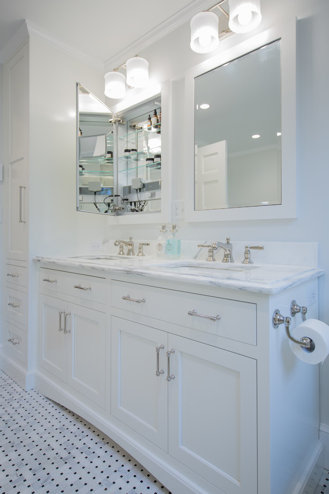 Mid-sized elegant master white tile and marble tile marble floor and white floor corner shower photo in Boston with shaker cabinets, white cabinets, an undermount tub, a two-piece toilet, gray walls, an undermount sink, marble countertops, a hinged shower door and white countertops