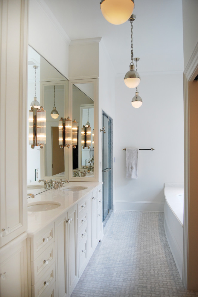Inspiration for a large transitional master gray floor and double-sink alcove shower remodel in DC Metro with recessed-panel cabinets, black cabinets, an undermount tub, white walls, an undermount sink, a hinged shower door, beige countertops and a built-in vanity