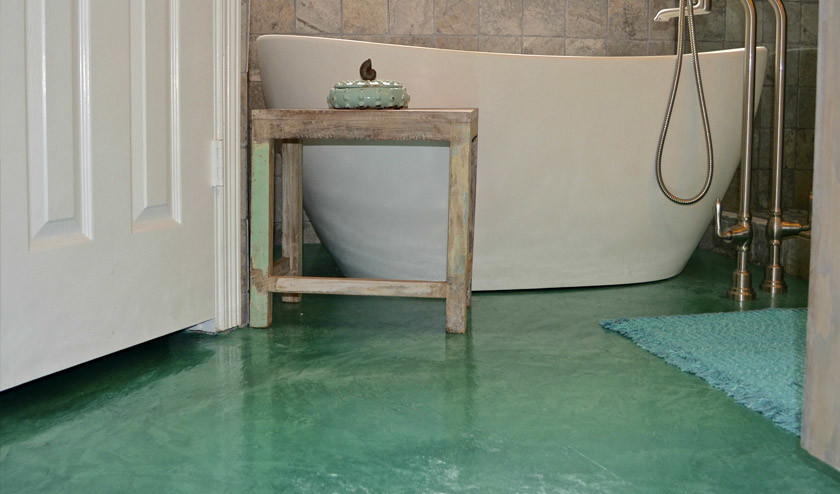 Ejemplo de cuarto de baño de estilo americano con suelo de cemento