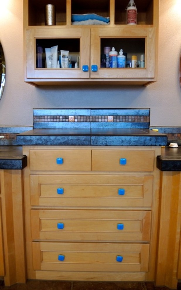 Turquoise glass knobs on bathroom vanity by Uneek Glass Fusions