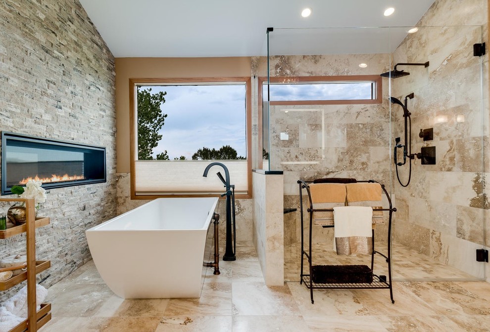 Large tuscan master beige tile and travertine tile travertine floor and beige floor bathroom photo in Denver with glass-front cabinets, beige cabinets, beige walls, an undermount sink, quartzite countertops and a hinged shower door