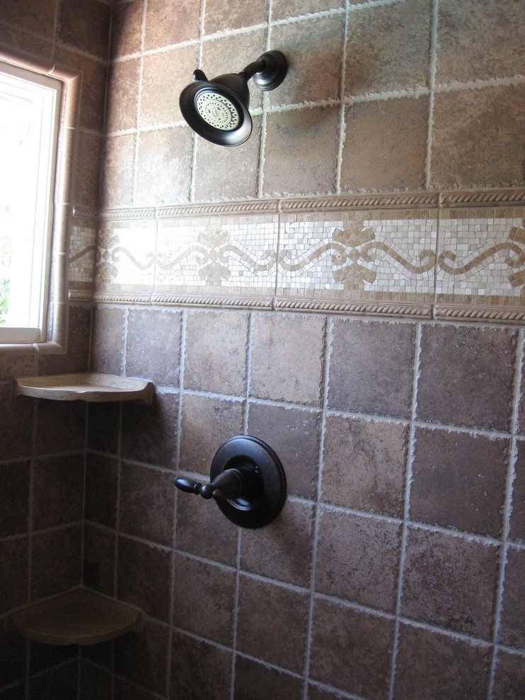 Example of a tuscan bathroom design in Orange County