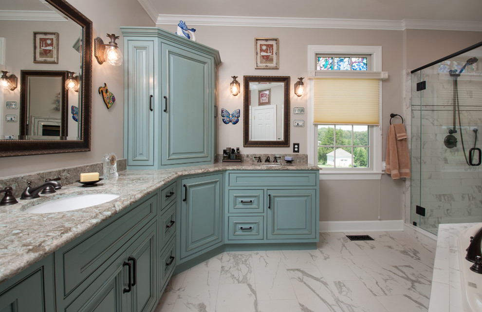 Large tuscan master bathroom photo in DC Metro with raised-panel cabinets, blue cabinets, an undermount sink, quartz countertops and a hinged shower door