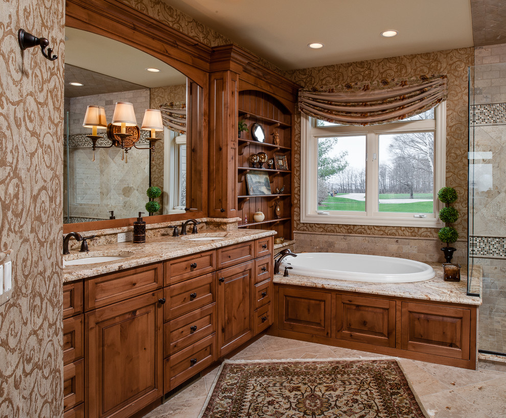 Bathroom - mid-sized traditional master beige tile and porcelain tile porcelain tile and beige floor bathroom idea in Other with dark wood cabinets, granite countertops, recessed-panel cabinets, beige walls, an undermount sink and a hinged shower door