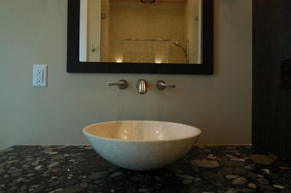 Example of a mid-sized tuscan 3/4 beige tile travertine floor bathroom design in Miami with a vessel sink, shaker cabinets, dark wood cabinets, granite countertops and green walls
